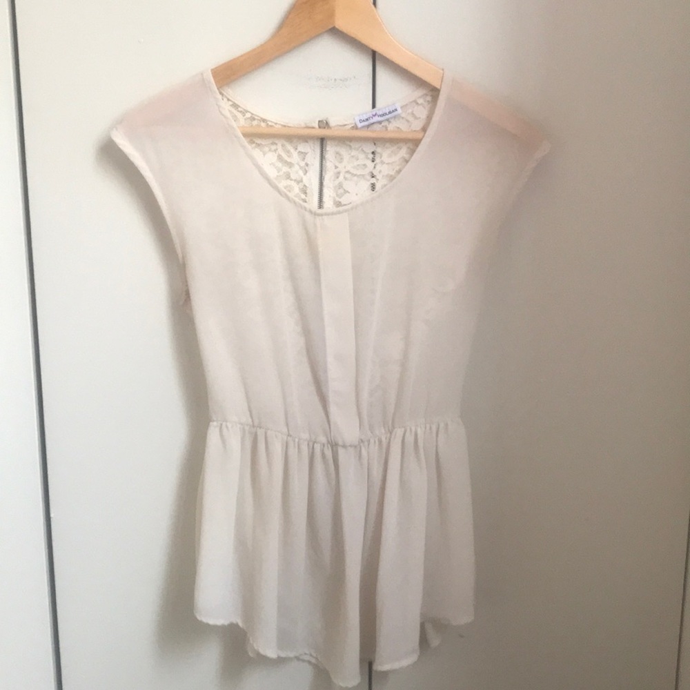 Sheer cream top with cinched waist and lace back